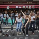 Parisians dance in the street at Fête de la Musique, 21 June. Photograph: Kiran Ridley/Getty Images