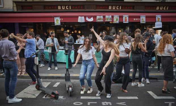 Parisians dance in the street at Fête de la Musique, 21 June. Photograph: Kiran Ridley/Getty Images