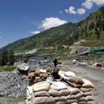 India's Border Security Force soldiers stand guard at a checkpoint along a highway leading to Ladakh, at Gagangeer in Kashmir's Ganderbal district June 17, 2020. (Reuters)