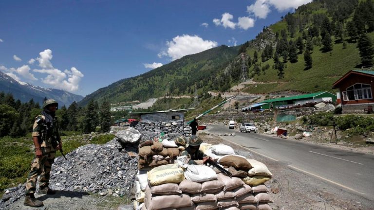 India's Border Security Force soldiers stand guard at a checkpoint along a highway leading to Ladakh, at Gagangeer in Kashmir's Ganderbal district June 17, 2020. (Reuters)