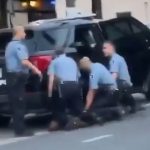 According to charging documents, Lane (seen far right) - who initially took Floyd into custody - held down the father-of-five's legs, while Keung held his back and Chauvin kneeled down on his neck for eight minutes and 45 seconds