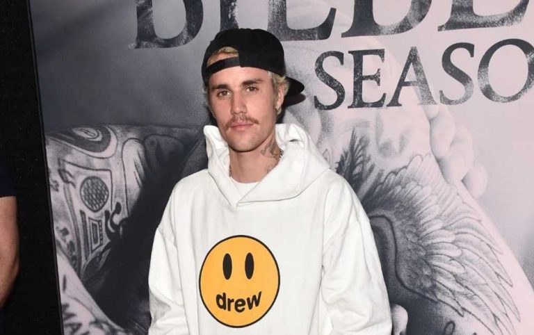 Justin Bieber stop using those photos now