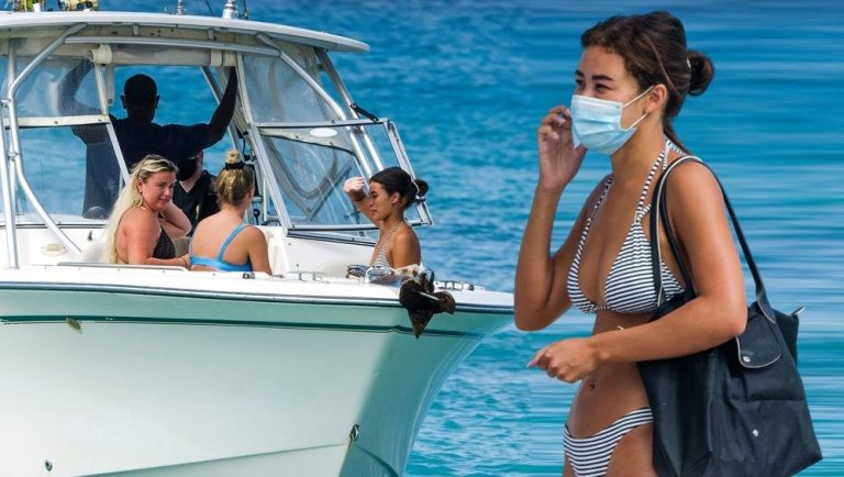 Montana Brown on vacation with face mask